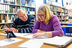 People researching records in NFHS Library